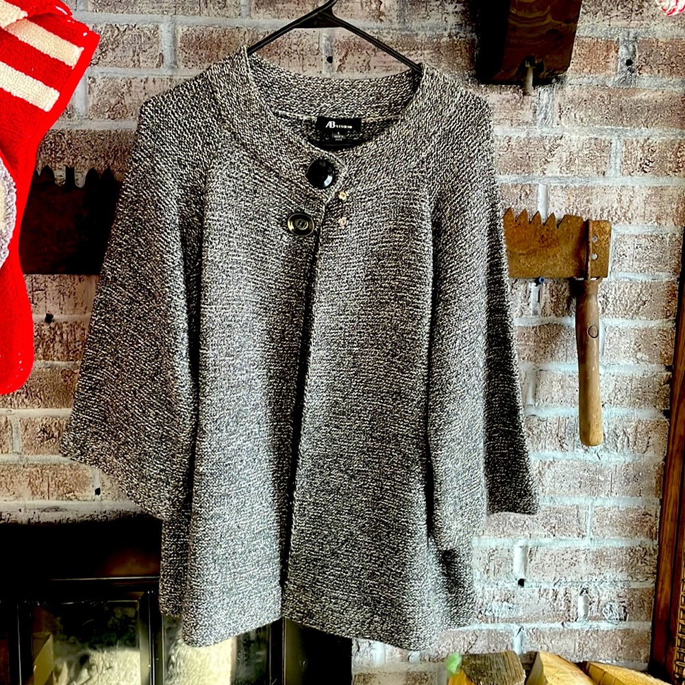 Gray, 3/4 sleeve coat.